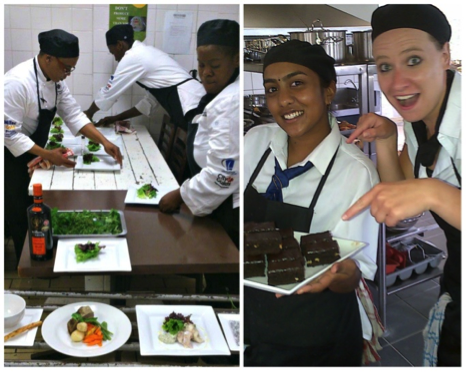 Culinary students arranging plates of food in a kitchen setting while smiling and engaging with each other. - International Hotel School