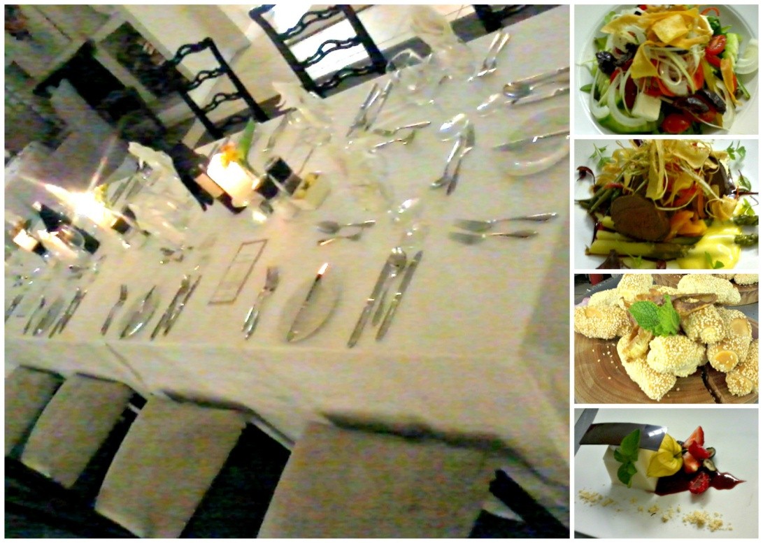 An elegantly arranged dining table with cutlery and multiple dishes including salads and desserts. - International Hotel School
