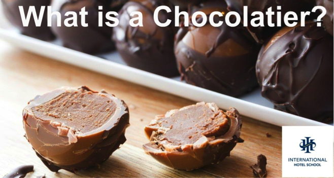 Chocolate truffles displayed on a wooden surface, with one truffle cut in half to reveal its filling. - International Hotel School