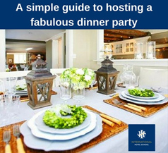 Elegant dinner party table setting with plates, cutlery, and decorative lanterns. - International Hotel School