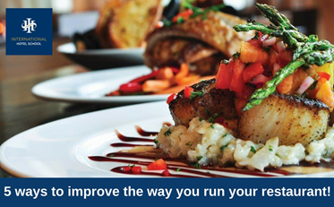 A plated dish featuring grilled fish garnished with vegetables and sauce on a bed of rice. - International Hotel School