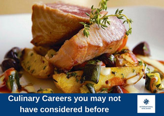 A plated culinary dish featuring grilled fish and assorted vegetables garnished with herbs. - International Hotel School
