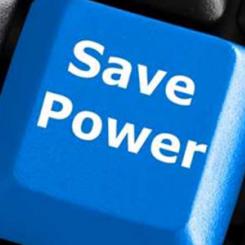 Close-up of a blue keyboard key labeled 'Save Power' on a black keyboard. - International Hotel School