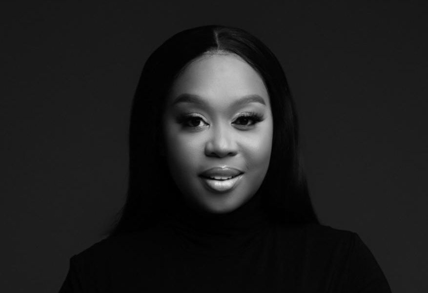 Black and white portrait of Mandy Mavuso with a neutral expression and long hair. - International Hotel School