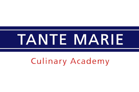 Logo of Tante Marie Culinary Academy featuring blue and red text. - International Hotel School